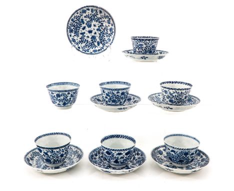 Blue and white floral decor, including double ring and twin fish, 18th Century, saucers are 13 cm. in diameter, in diverse co