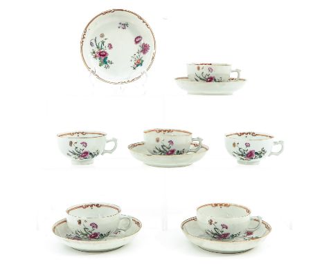 Including 6 cups and 5 saucers in Famille Rose decor, saucers are 13 cm. in diameter, chip and hairline. 