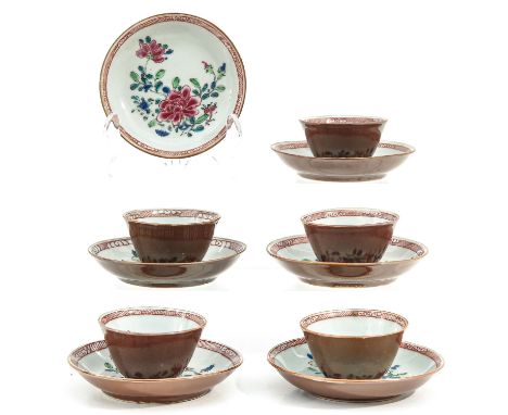 Including 5 cups and 6 saucers, Famille Rose floral decor, 18th Century, saucers are 10 cm. in diameter, chip and hairline.
