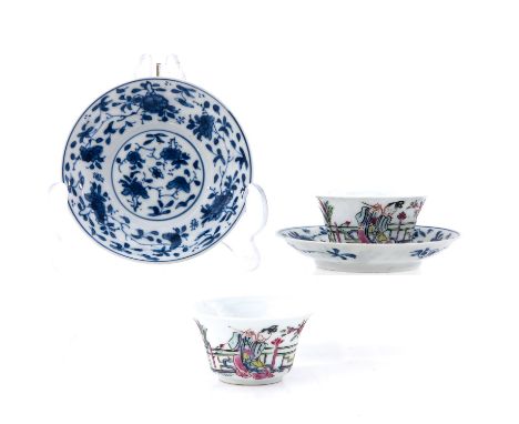 Including 2 Famille Rose cups and 2 blue and white floral decor saucers 10 cm. in diameter, chip and hairline.