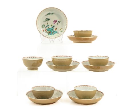 Depicting scene in garden with flowers in Famille Rose enamels, 18th Century, saucers are 14 cm. in diameter, chip and hairli