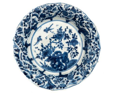 Depicting scene in garden with rocks, flowers, and birds, 21 cm. in diameter, marked with double ring and sacred fungus, chip