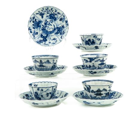 Decorated with flowers in garden, including 5 cups and 6 saucers, saucers are 11 cm. in diameter, chip and hairline.