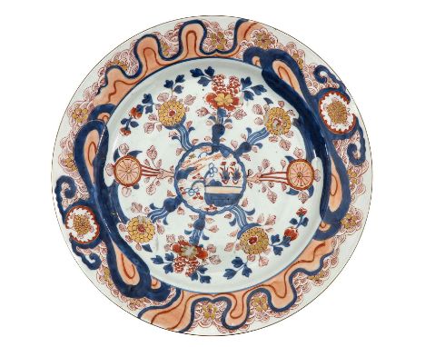 Decorated with flowers and scene in garden in iron red, blue and gold enamels, marked with double ring and sacred fungus, 18t