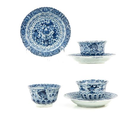 Decorated with sea creatures, 18th Century, marked with double ring and sacred fungus, saucers are 14 cm. in diameter, chip.