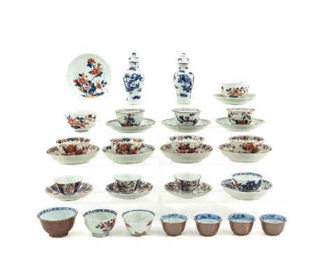 35 pieces including cups, saucers, and small garniture vases, including 18th Century, in diverse conditions.