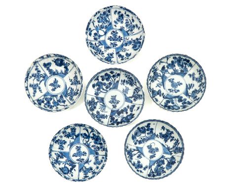 Blue and white floral decor, marked with double ring and sacred fungus, saucers are 14 cm. in diameter, with restoration.
