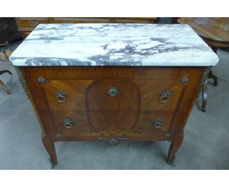 A French Louis XV style walnut and marquetry inlaid commode, with white marble top