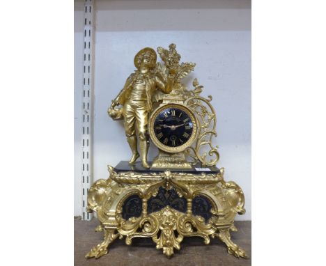 A 19th Century French gilt metal mantel clock