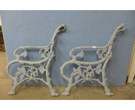 A pair of Victorian cat iron bench ends, attributed to Coalbrookdale