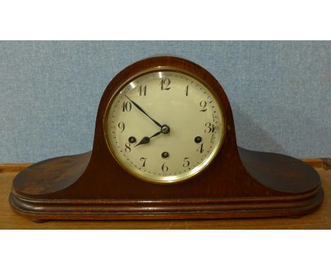 An oak mantel clock