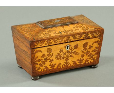 A Regency/William IV rosewood marquetry tea caddy, sarcophagus form, two interior compartments and raised on bun feet.  Width