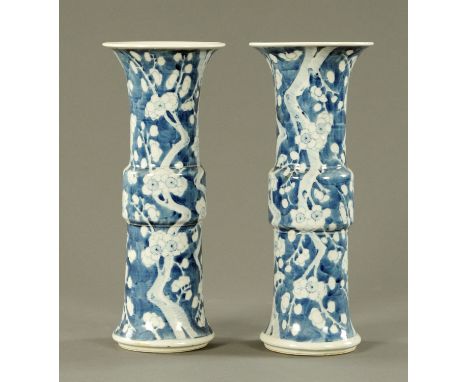 A pair of Chinese prunus gu shaped vases, 19th century, pseudo four character Kangxi mark.  Height 35 cm.    CONDITION REPORT