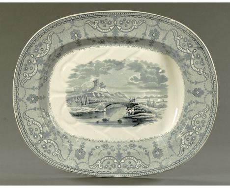 A Copeland transfer printed turkey plate, mid 19th century, depicting a castle ruin with three figures on a bridge and cattle