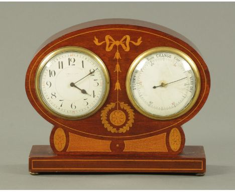 An Edwardian inlaid mahogany combined clock and barometer desk accessory.  Height 20 cm, width 24 cm.  