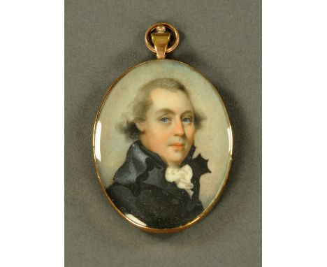 A portrait miniature on ivory, gentleman, early 19th century, mounted in copper frame and backing, with suspension loop.  Ima