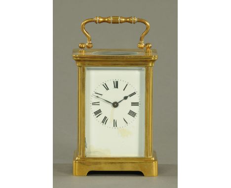 An Edwardian brass carriage clock, timepiece only.  Height 11.5 cm.