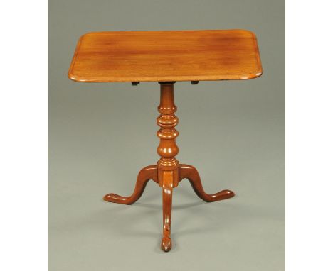 A Victorian mahogany rectangular tripod table, with turned column and three downswept legs terminating in pad feet.  Length 7