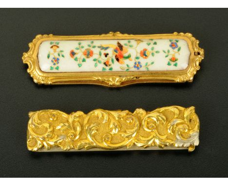 Two gilt metal buckles, 19th century, one with enamel panel inset with coloured foils depicting an exotic bird on a flowering