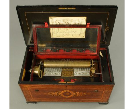 A late 19th century Swiss musical box, rosewood cased, large form, also with organ type mechanism, playing six airs, waltz, L