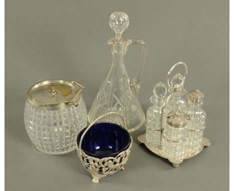 A silver plated cruet set, glass biscuit barrel, sugar bowl with plated stand and glass decanter with stopper.    CONDITION R