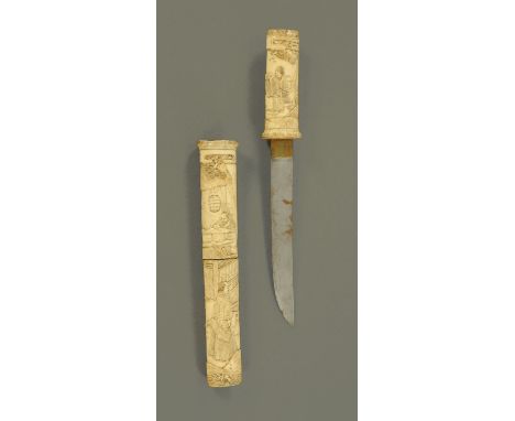 A Japanese Wakizashi, late 19th century, the bone hilt and sectional scabbard well carved with figures and dwellings beneath 