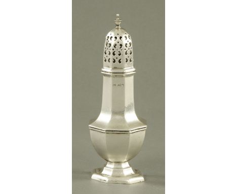 A silver sifter, Walker & Hall, Sheffield 1923, the pierced lid with urn finial above an inverted baluster octagonal body.  H