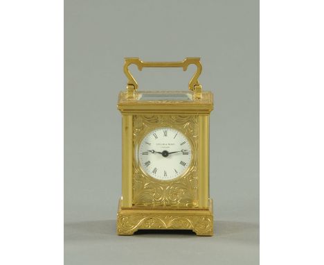 A Taylor & Bligh miniature brass carriage clock, 47/500, "HM Queen Elizabeth The Queen Mother 4th August 1985", timepiece onl