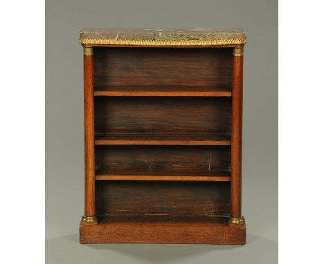 A Regency rosewood small open bookcase, with marble top, turned columns, adjustable shelves and plinth base.  Width 88 cm.  C