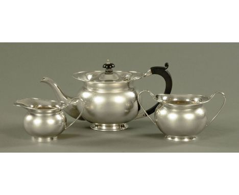 A three piece matching tea service, Fattorini & Sons Ltd., Birmingham 1923, 1930 and 1946.  Teapot height 15 cm, 894 grams gr