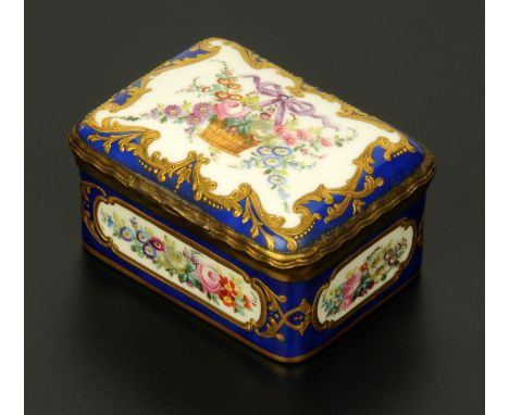A good Sevres style porcelain trinket box, 19th century, the slightly bowed lid handpainted with a basket overflowing with fl