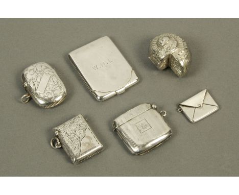 Four silver Vesta cases, various dates and makers, a silver stamp holder in the form of an envelope and a silver plated Vesta