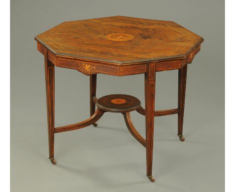 An Edwardian inlaid rosewood octagonal centre table, raised on tapered legs of square section united by stretchers and raised