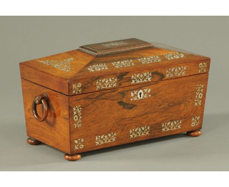 A William IV rosewood inlaid mother of pearl tea caddy, with two compartments and glass bowl and raised on short bun feet.  W