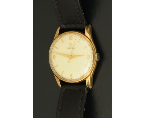 A gentleman's Omega 9 ct gold wristwatch, with champagne dial, manual.  Case diameter 31 mm (see illustration).    CONDITION 