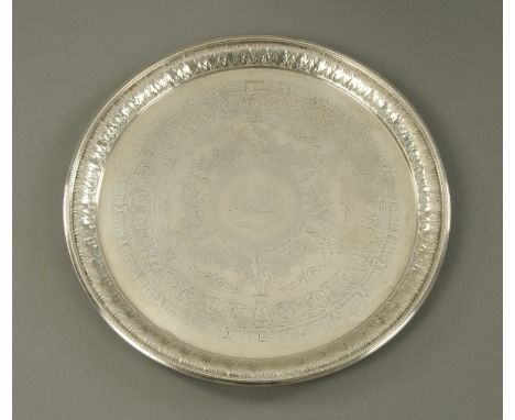 A large silver salver, Walker & Hall, Sheffield 1896, the centre with engraved crest of a boars head between branches and wit