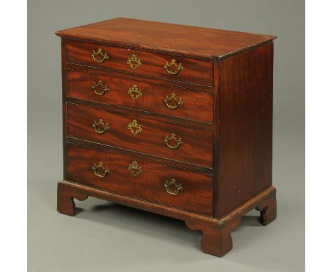A George III mahogany chest of drawers, with four long graduated drawers with brass drop handles with shaped backplates and r