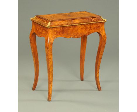 A Victorian inlaid walnut jardiniere topped table, with rectangular lift out panel, with shaped apron and raised on cabriole 