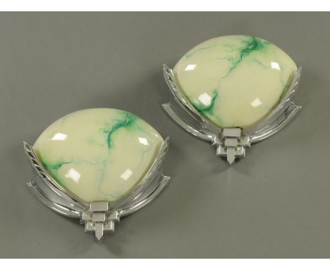 A pair of Art Deco chrome plated and glass wall light fittings.  Width +/- 29 cm, height 26 cm (see illustration). 