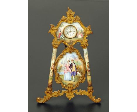 A ladies gilt metal and enamel boudoir clock, the enamel dial with Roman numerals and floral decoration above a central panel