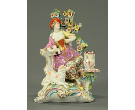 A Samson porcelain figural candlestick, 19th century, after an 18th century Derby model, female seated before a flowering boc