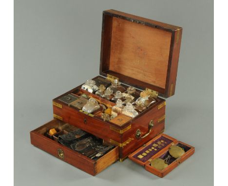 Military Interest - A George III mahogany apothecary chest, circa 1790-1800, rectangular form, the lid with engraved brass me