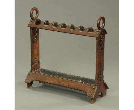 A late Victorian hall stick stand, with galvanised drip tray.  Width 75 cm. 