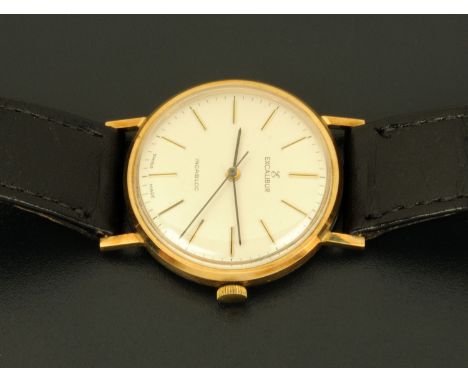 A 9 ct gold cased Excalibur wristwatch, Incabloc, manual, 1983, original box and guarantee.  