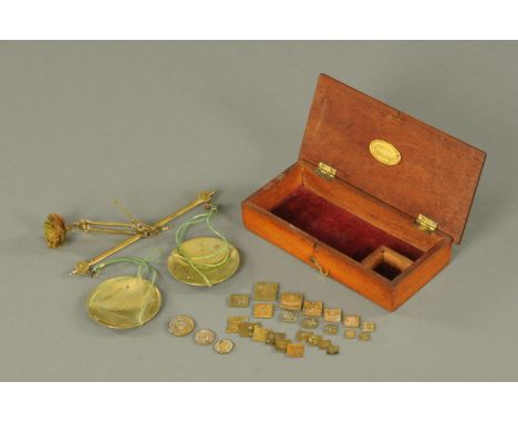 A set of hand held brass apothecary scales, 19th century, with box ends, the beam stamped "P. Rogers & Co.", to weigh 2 ozs (