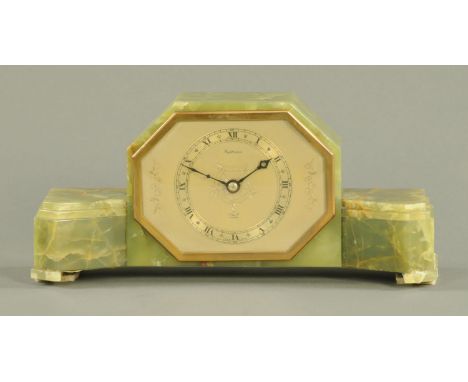 An Art Deco onyx cased mantle clock, with Elliott movement and marked "Fattorini". 
