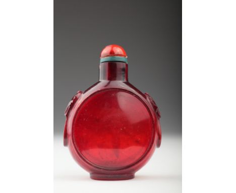 Age: Qing dynasty   Description: A Chinese ruby red Beijing / Peking glass snuff bottle, of flattened tapering ovoid form. We