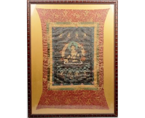 Age: 19th century  Description: A Tibetan thangka possibly of Syamatara, painted on silk with brocaded textile borders.  Size