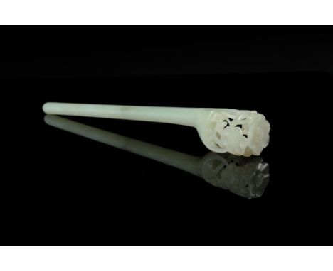 Age: Ming-Qing Dynasty  Description: A pale celadon jade hairpin carved with a long terminal tapered and pointed to one end a