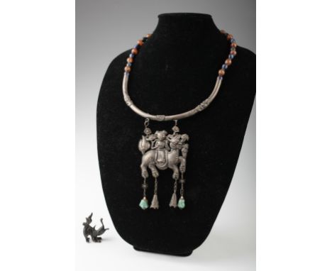 Age: Probably Qing   Description: A Chinese silver necklace and pendant the necklace with cloisonne and carnelian beads, silv